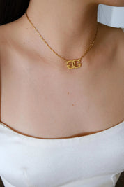 Vintage Givenchy gold tone G logo choker necklace, refined Parisian designer jewelry with timeless elegance