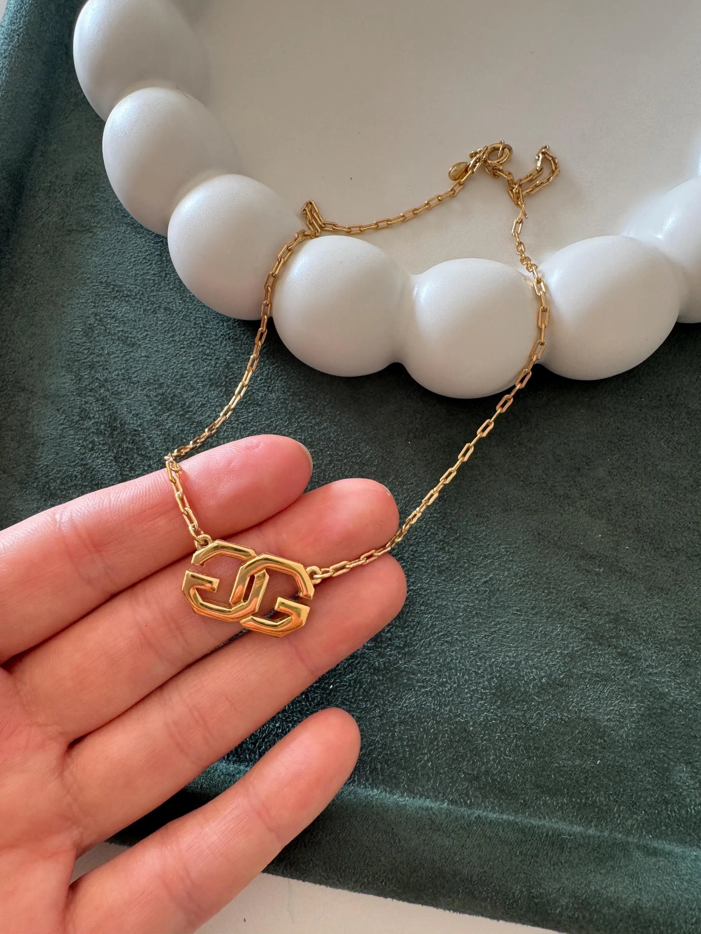 Vintage Givenchy gold tone G logo choker necklace, elegant luxury designer jewelry for women
