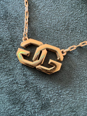 Vintage Givenchy gold tone G logo choker necklace, luxury designer jewelry for women who love iconic brands