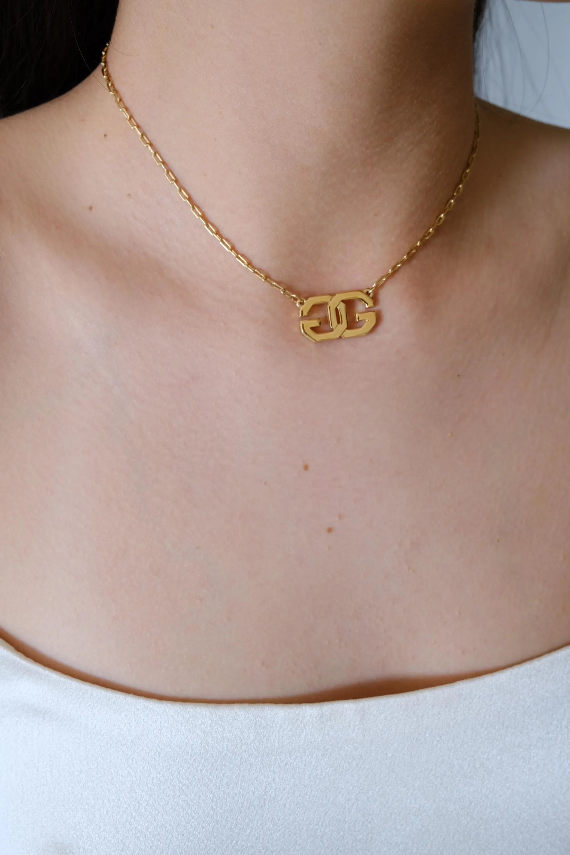 Authentic vintage Givenchy G logo choker, gold tone Paris designer necklace with refined elegance