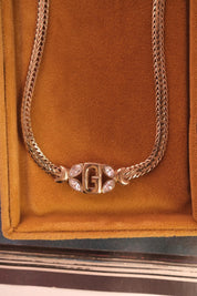 Vintage Givenchy gold tone G logo necklace, iconic designer jewelry and timeless investment piece