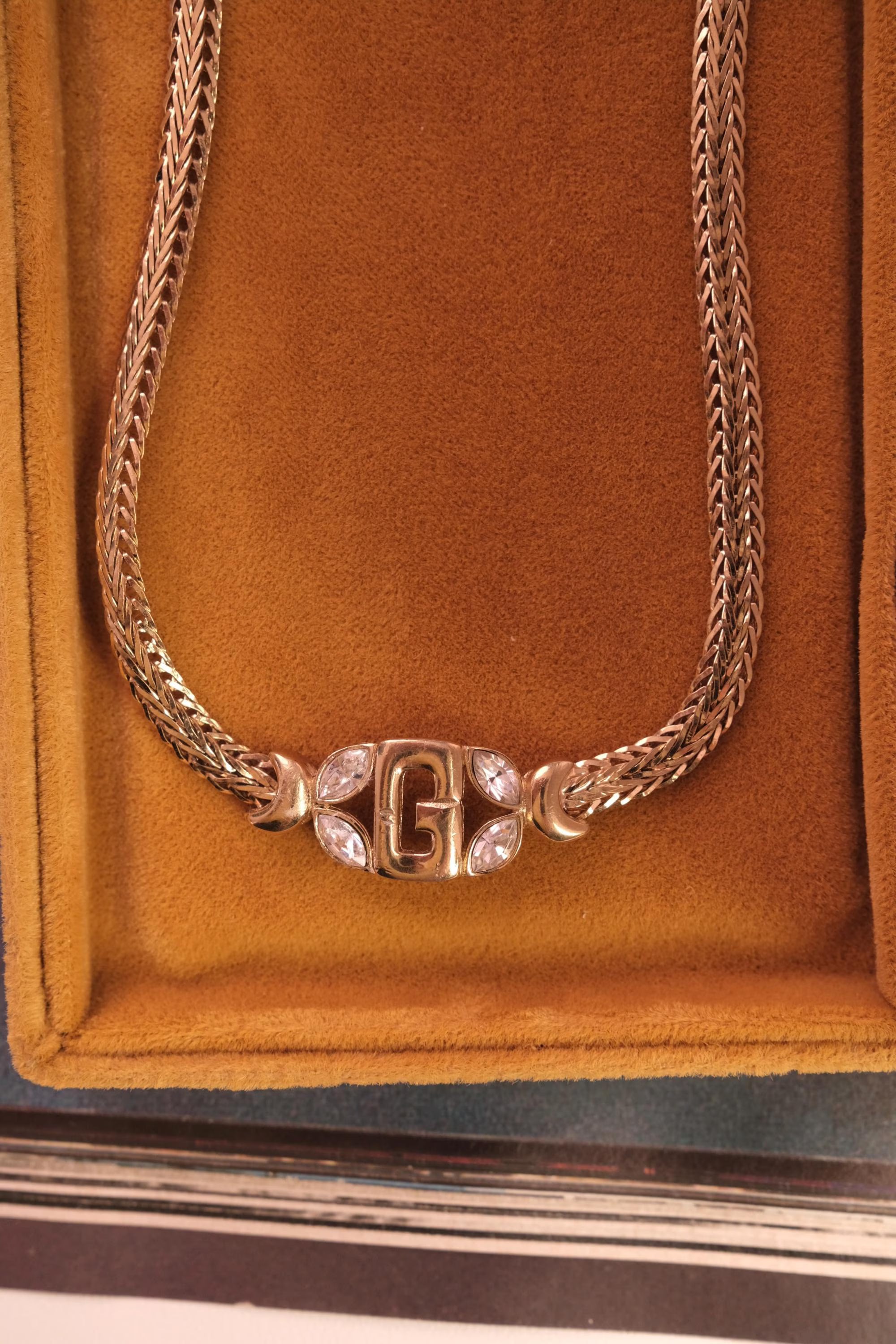 Vintage Givenchy gold tone G logo necklace, iconic designer jewelry and timeless investment piece