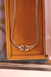 Vintage Givenchy gold tone G logo necklace, classic minimalist designer jewelry for women