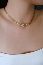 Vintage Givenchy gold tone G logo necklace, iconic designer jewelry and timeless investment piece