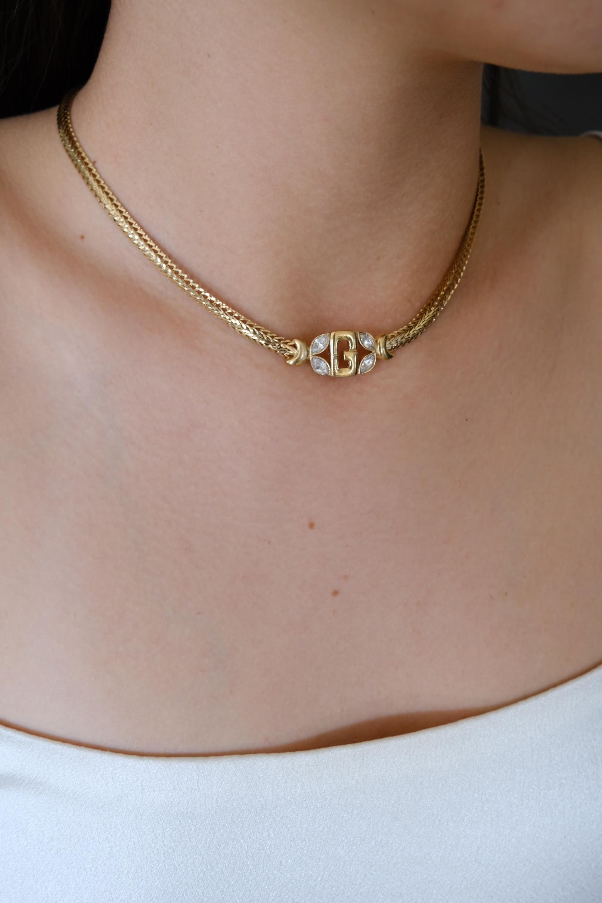 Vintage Givenchy gold tone G logo necklace, iconic designer jewelry and timeless investment piece