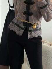 Vintage Givenchy gold-tone heart chain styled as a designer belt