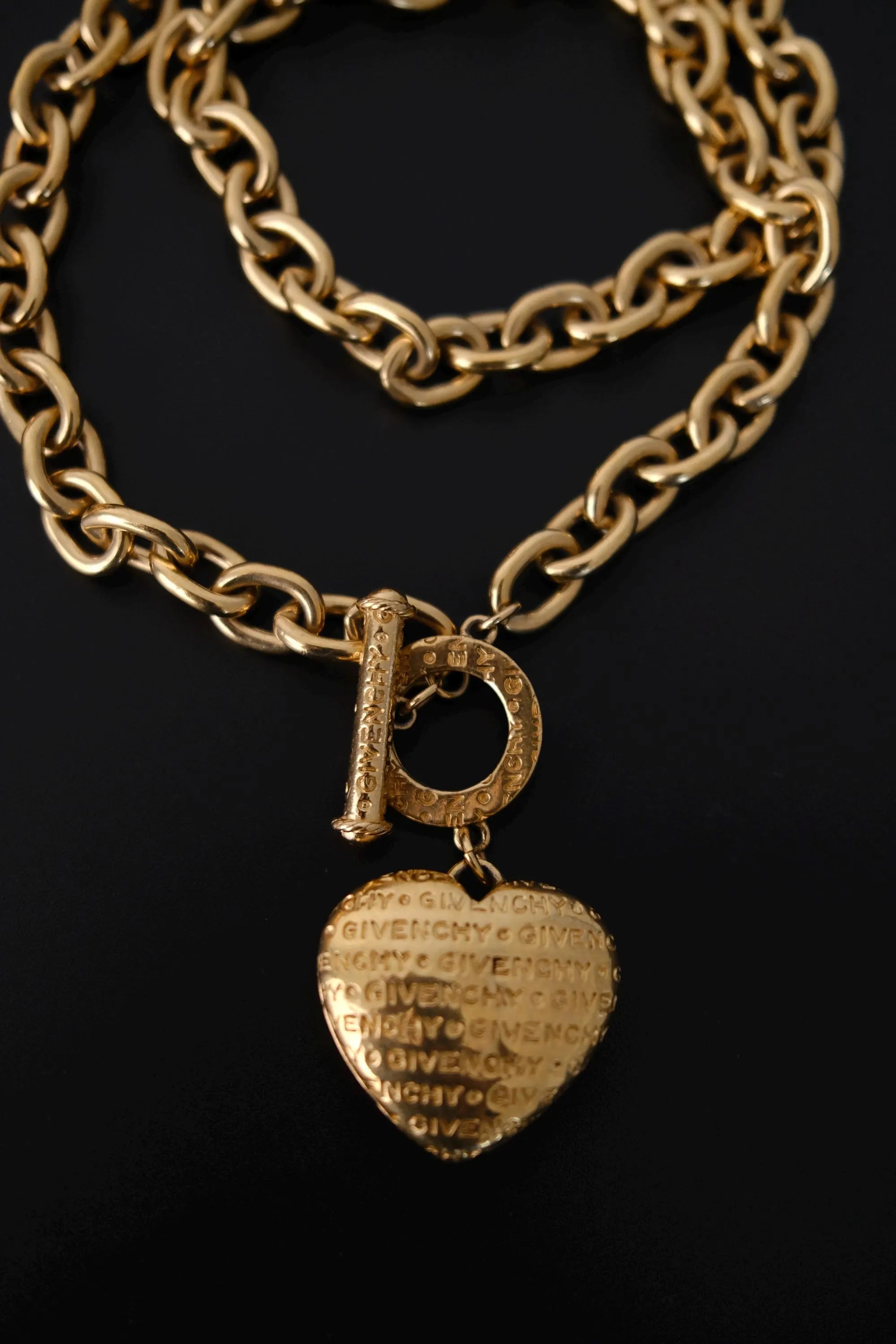 Vintage Givenchy gold-tone heart charm with GIVENCHY embossed detailing