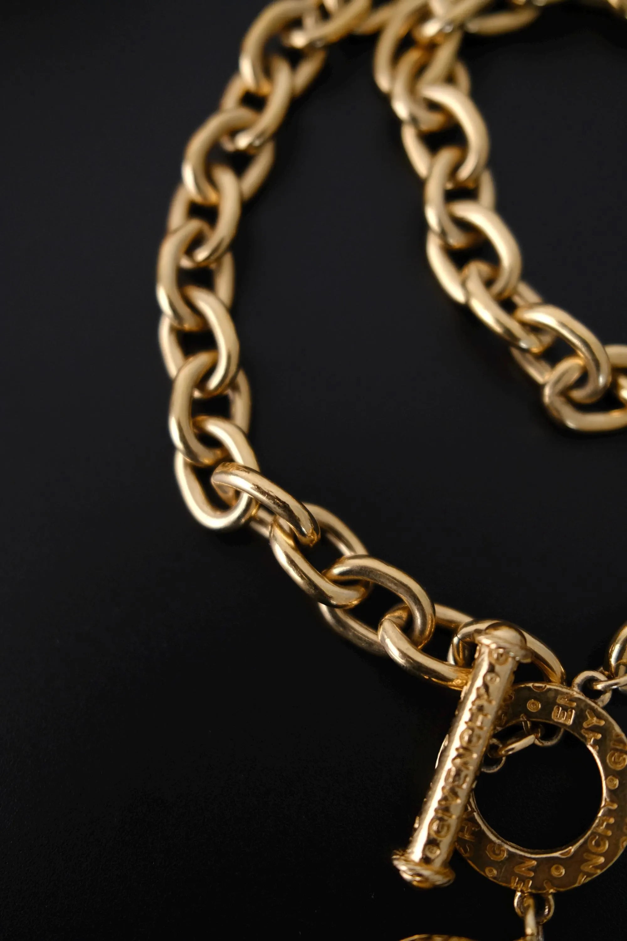 Vintage Givenchy statement toggle closure with signature detailing