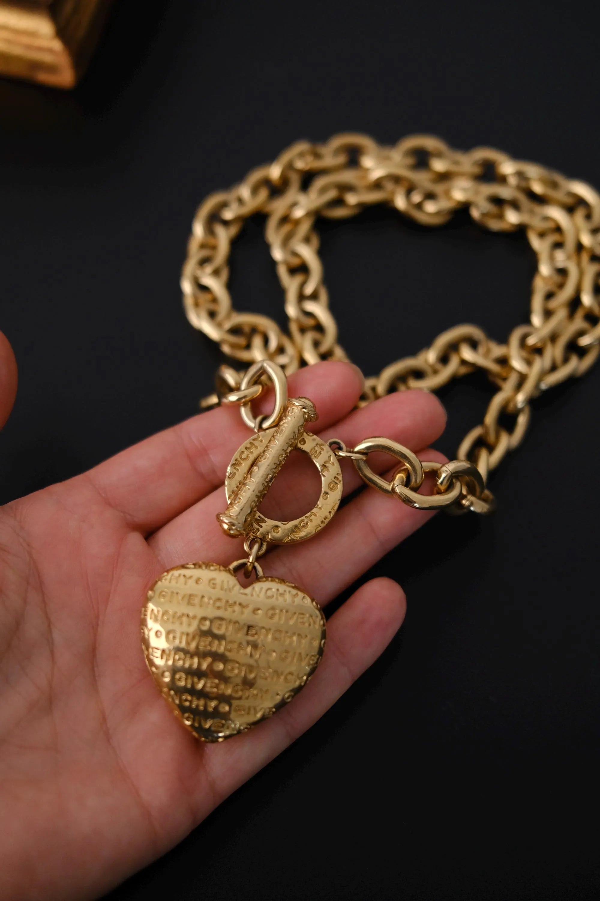Vintage Givenchy gold-tone heart charm with GIVENCHY embossed detailing