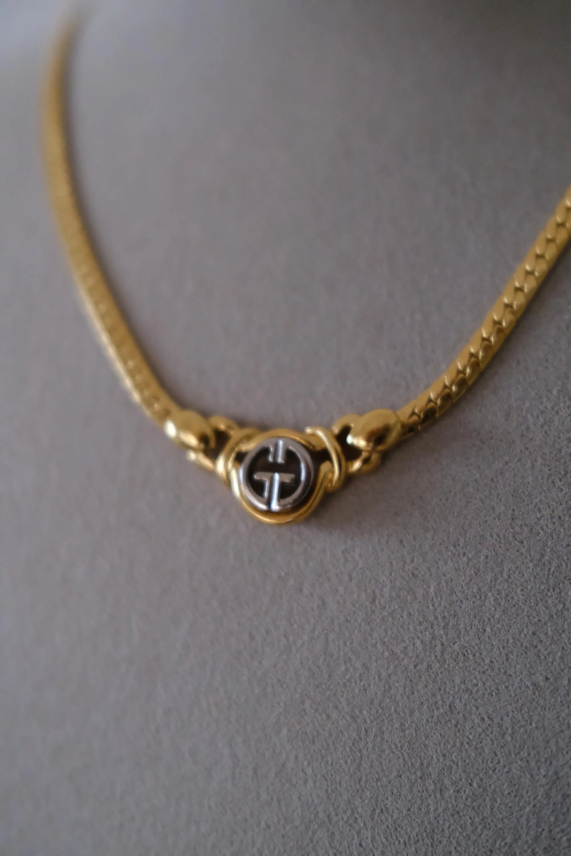 Vintage Givenchy gold-tone logo charm choker necklace detail