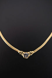 Vintage Givenchy gold-tone logo charm choker necklace detail