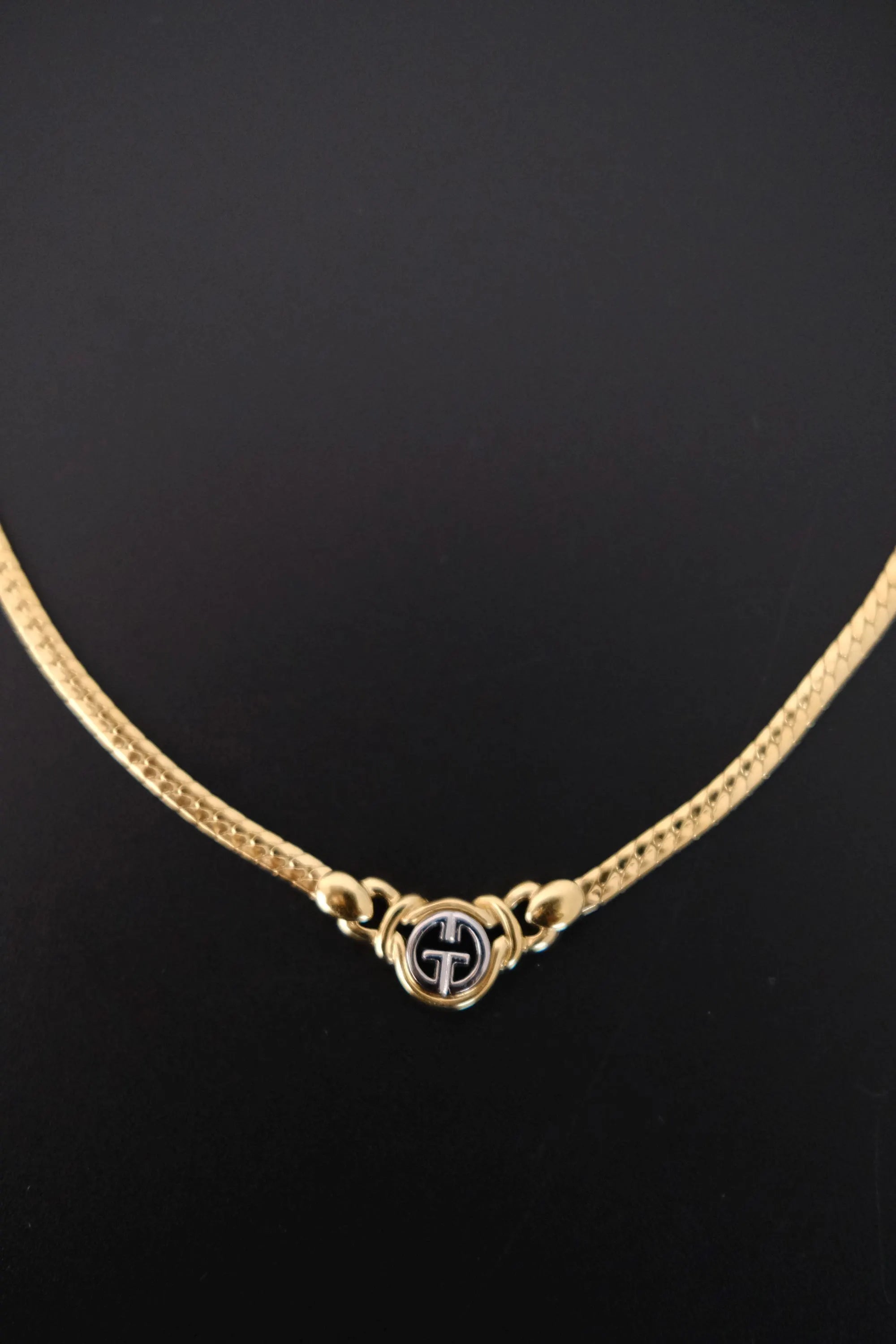 Vintage Givenchy gold-tone logo charm choker necklace detail