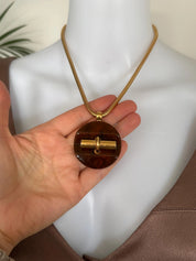 Vintage Givenchy gold tone snake chain necklace, designer statement pendant jewelry for women who love luxury accessories