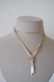 Vintage Gucci 925 silver wrap necklace styled as a layered choker