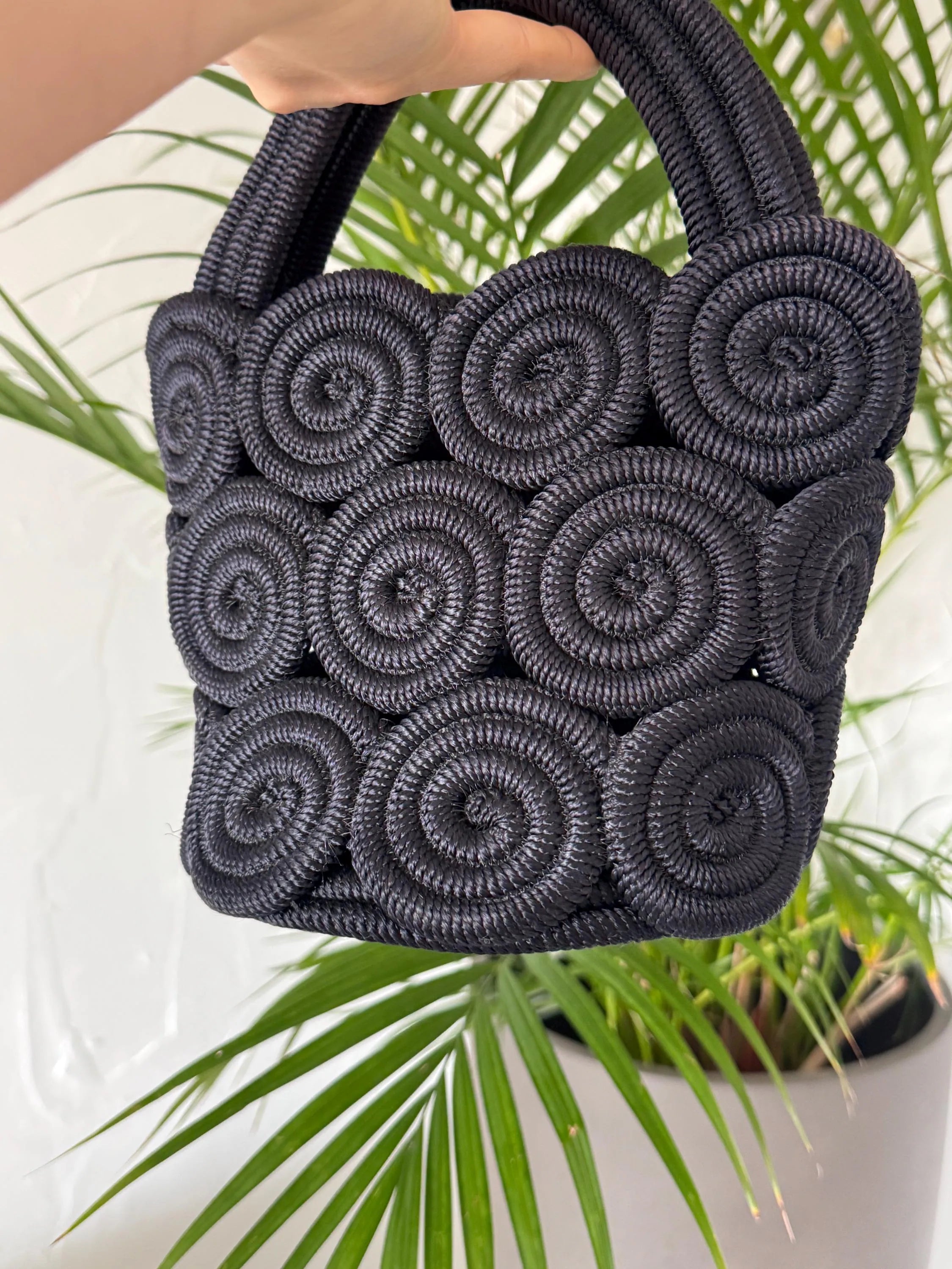 Vintage Nina Ricci handcrafted rope handbag, sculptural black design and rare French luxury piece for sophisticated women