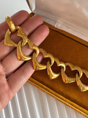 Vintage YSL gold heart link bracelet, feminine statement jewelry with modern edge