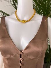 Vintage YSL gold snake chain necklace by Yves Saint Laurent, unisex Y2K designer jewelry with sleek minimalist chain design