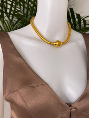 Vintage YSL gold snake chain necklace by Yves Saint Laurent, unisex Y2K designer jewelry with sleek minimalist chain design