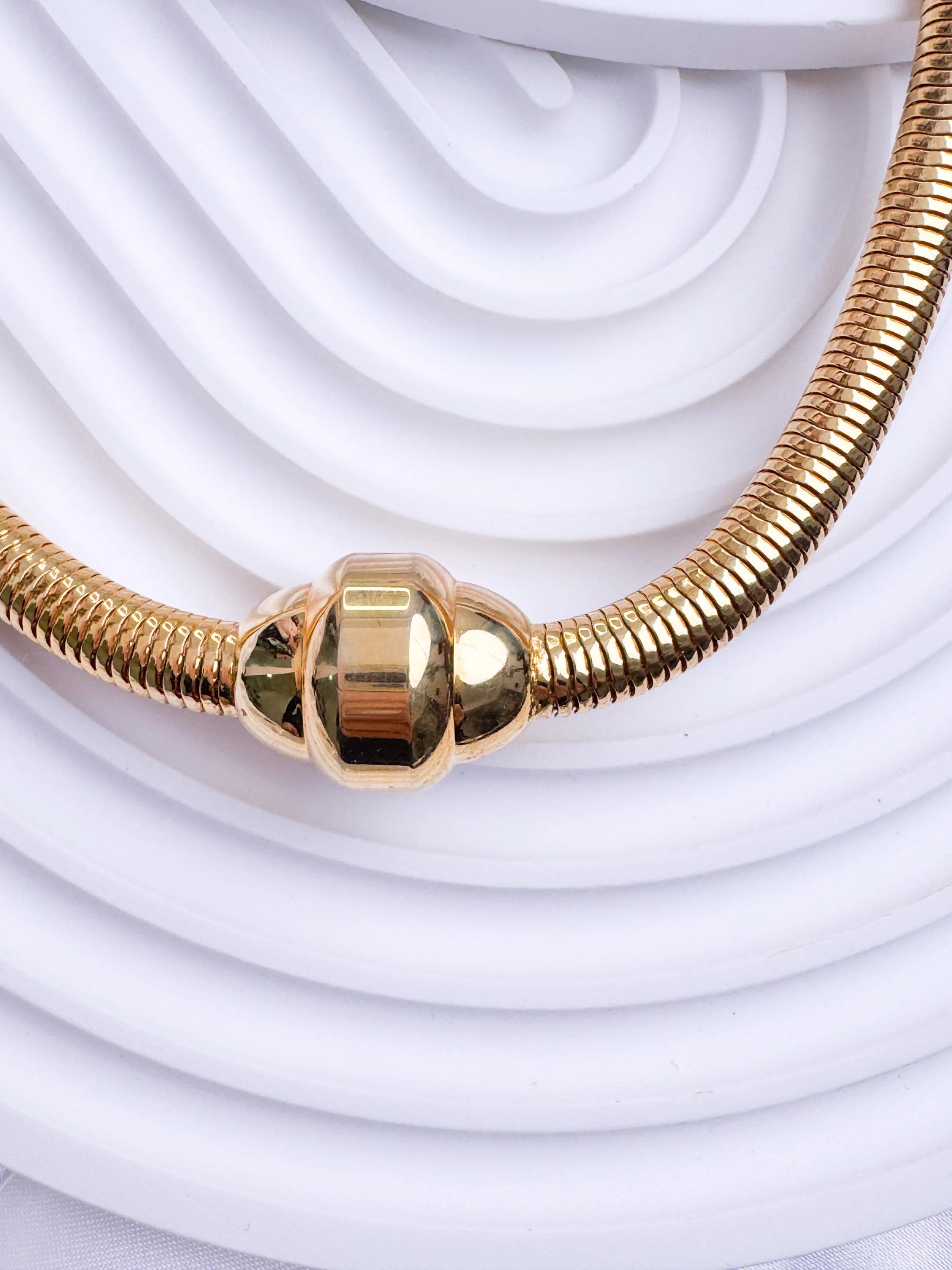 Vintage YSL gold snake chain necklace by Yves Saint Laurent, unisex Y2K designer jewelry with sleek minimalist chain design