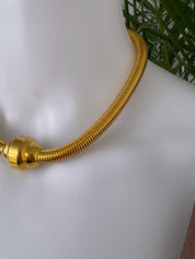 Vintage YSL gold snake chain necklace by Yves Saint Laurent, unisex Y2K designer jewelry with sleek minimalist chain design