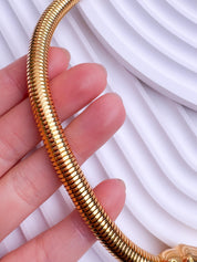 Vintage YSL gold snake chain necklace by Yves Saint Laurent, unisex Y2K designer jewelry with sleek minimalist chain design