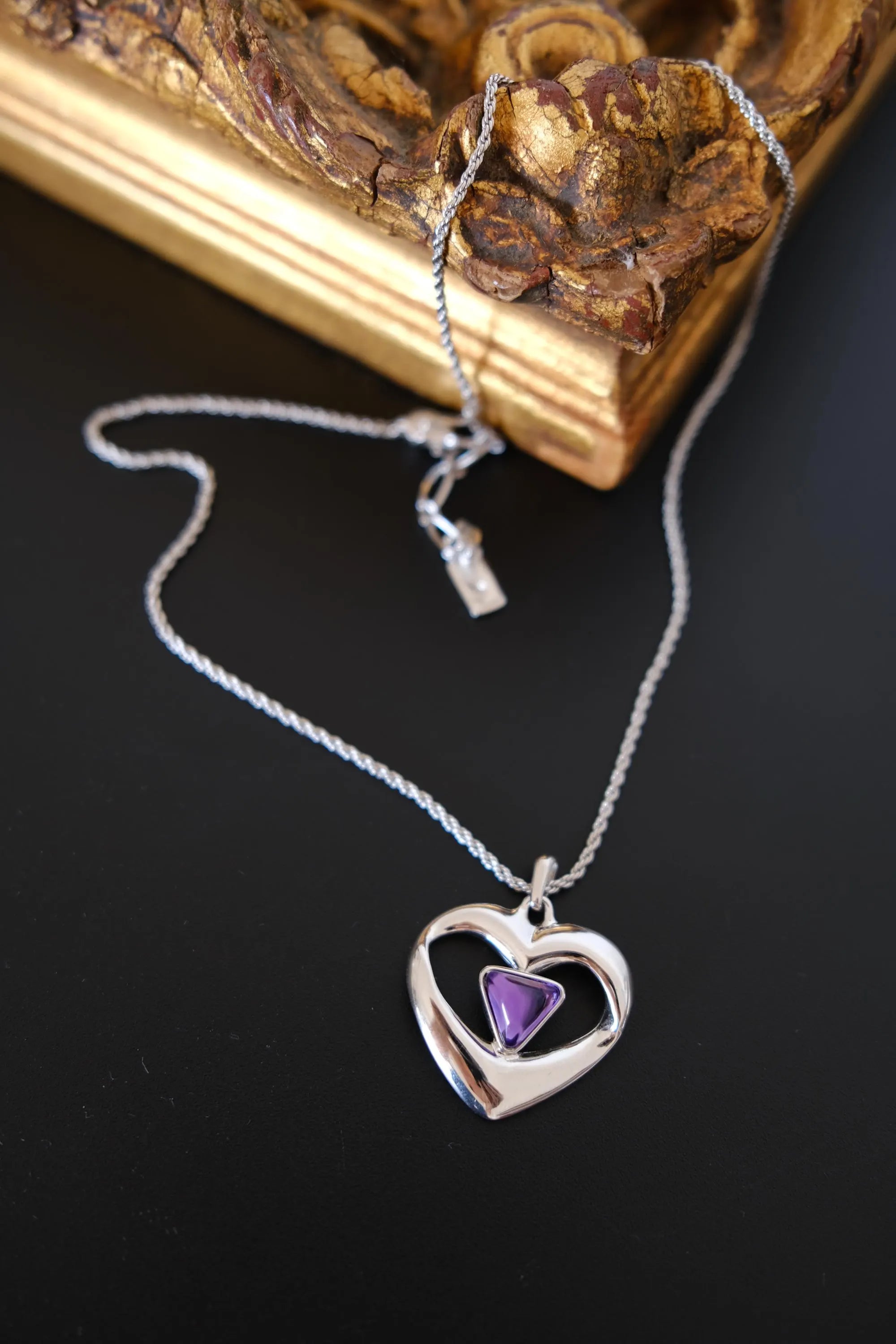 Vintage Yves Saint Laurent YSL silver-tone openwork heart pendant necklace with purple cabochon