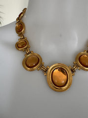 Vintage Yves Saint Laurent cabochon necklace with gold tone finish, timeless designer gift for women