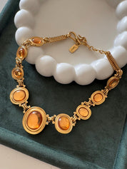 Vintage YSL gold tone cabochon necklace, classic statement jewelry and ideal gift for women