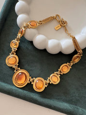 Vintage Yves Saint Laurent gold tone cabochon necklace, statement designer jewelry for women