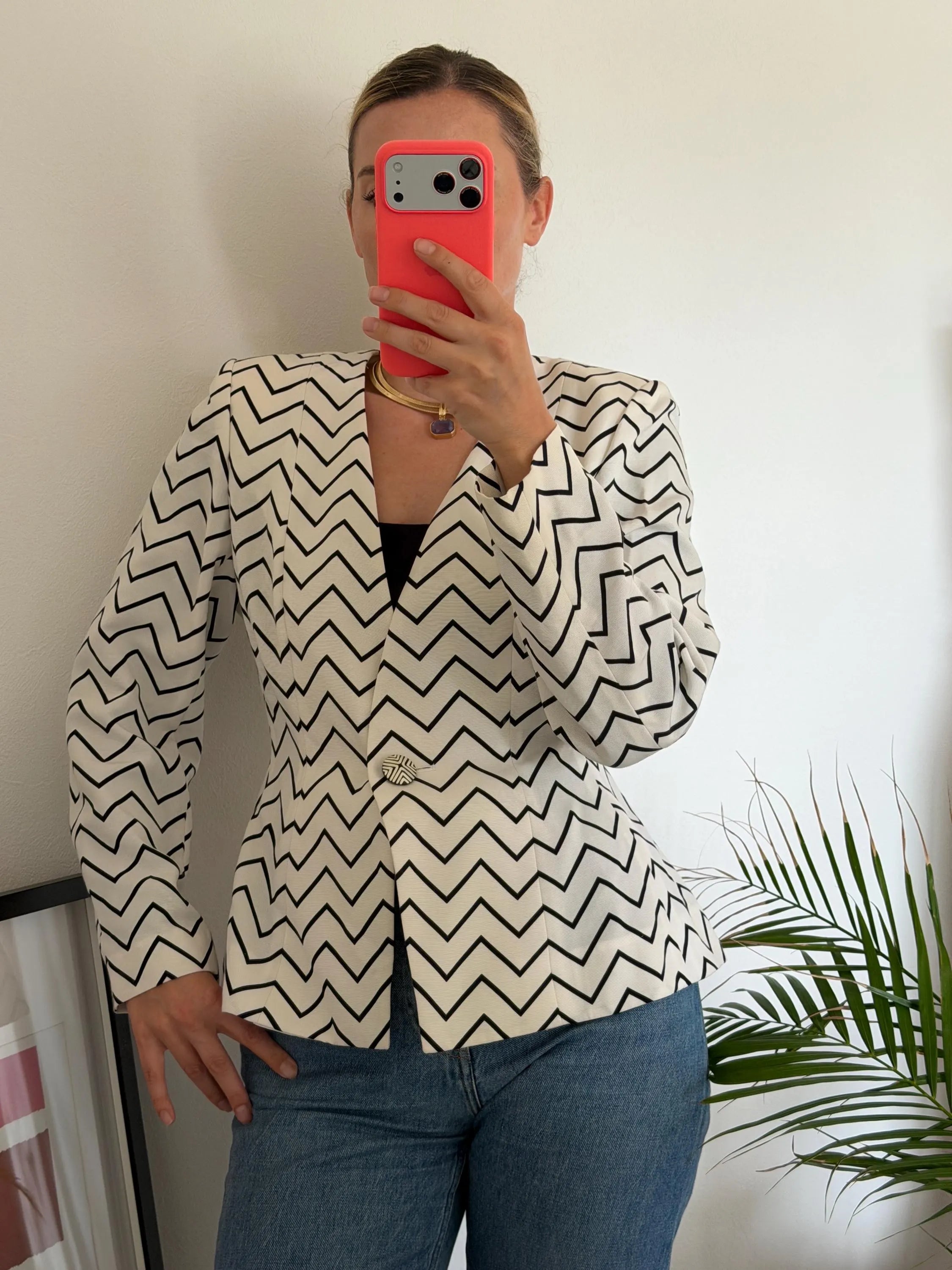 Vintage Yves Saint Laurent zigzag jacket worn with deep V neckline