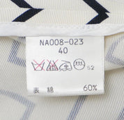 Vintage Yves Saint Laurent jacket fabric and care label detail