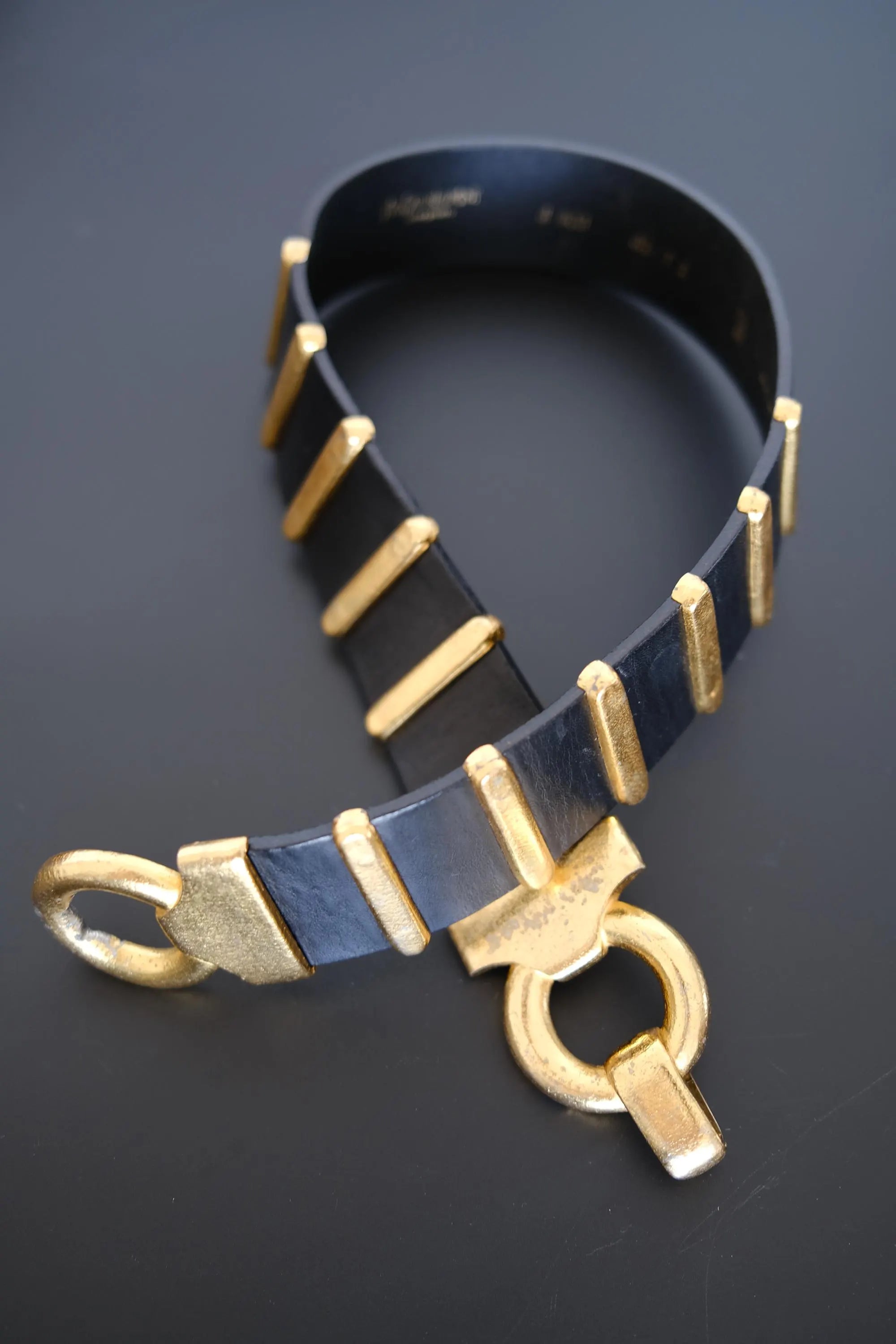 Vintage 1980s Yves Saint Laurent Rive Gauche black leather statement belt with gold-tone hardware