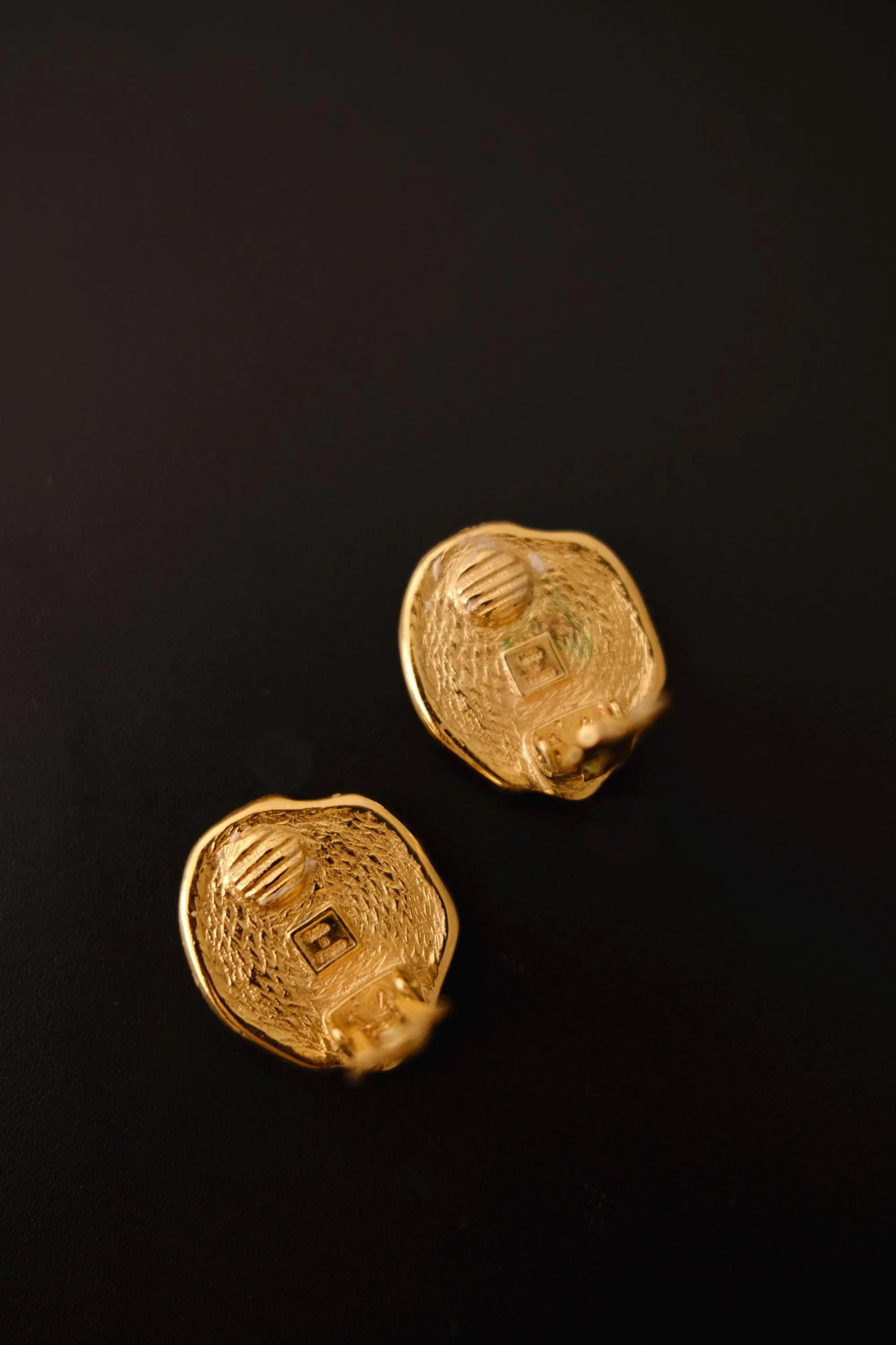 Vintage YSL seashell earrings reverse with YSL and Made in France signature