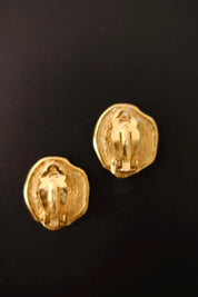 Vintage Yves Saint Laurent seashell earrings clip-on closure detail
