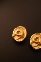 Vintage YSL sculptural seashell earrings textured gold-tone detail