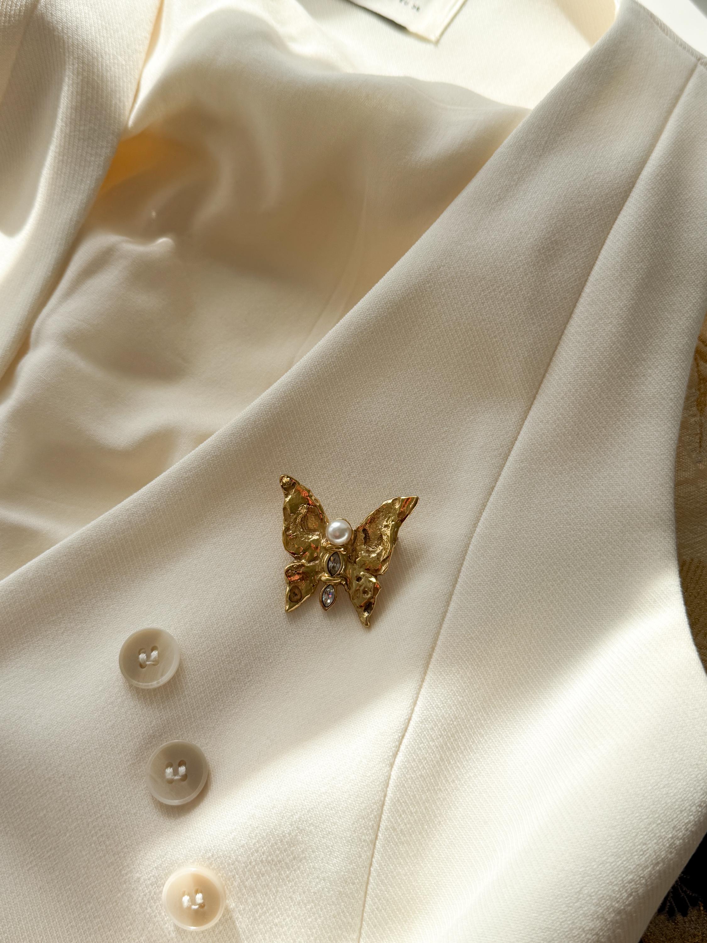 Authentic vintage YSL gold butterfly brooch, refined French designer jewelry with soft pearl detail