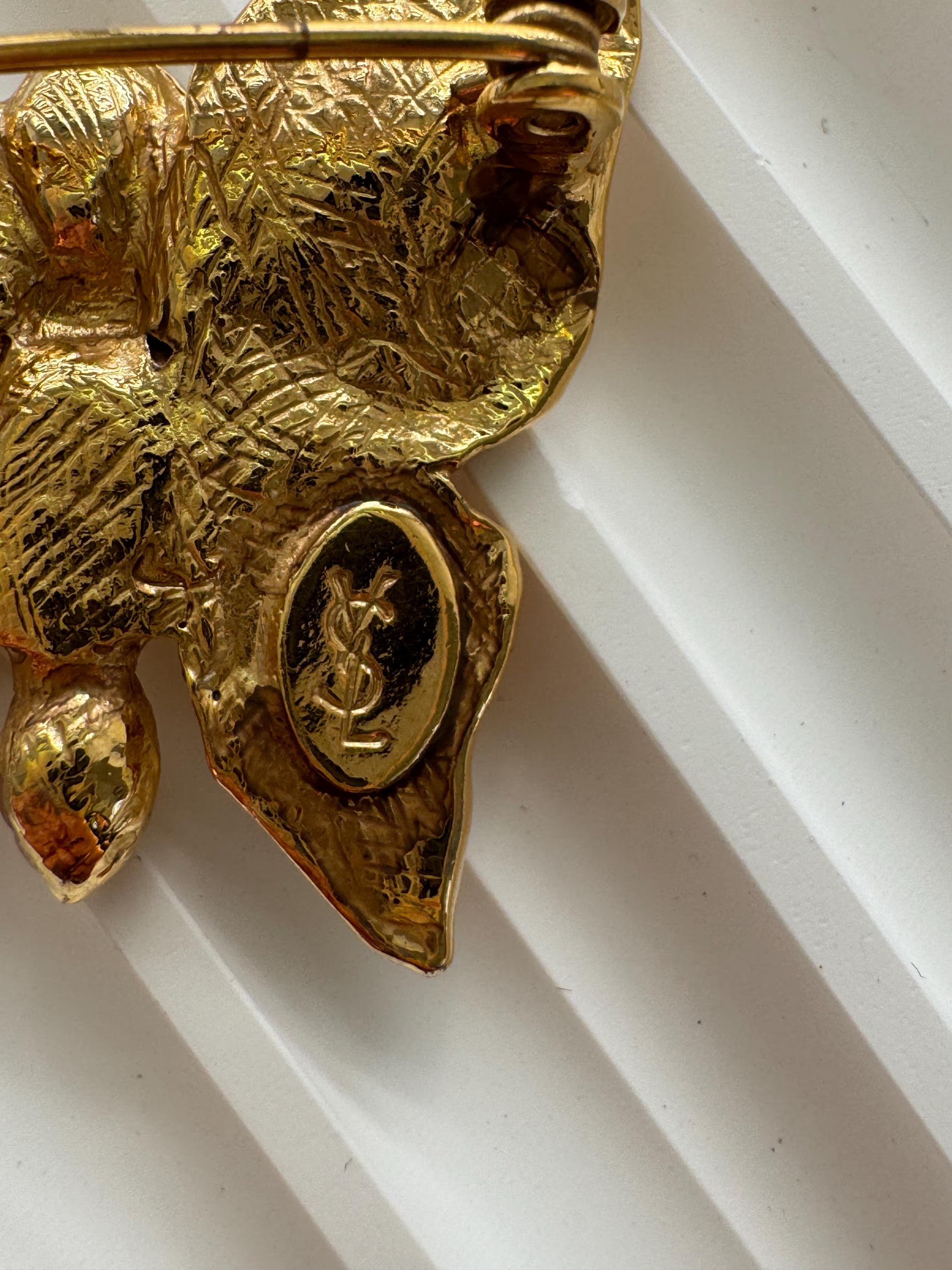 Vintage Yves Saint Laurent sculptural gold butterfly brooch, collectible couture piece with pearl and crystal accents