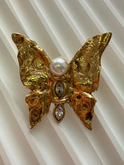 Vintage Yves Saint Laurent sculptural gold butterfly brooch, collectible couture piece with pearl and crystal accents