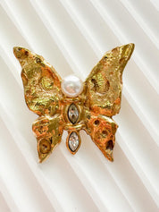 Authentic vintage YSL gold butterfly brooch, refined French designer jewelry with soft pearl detail