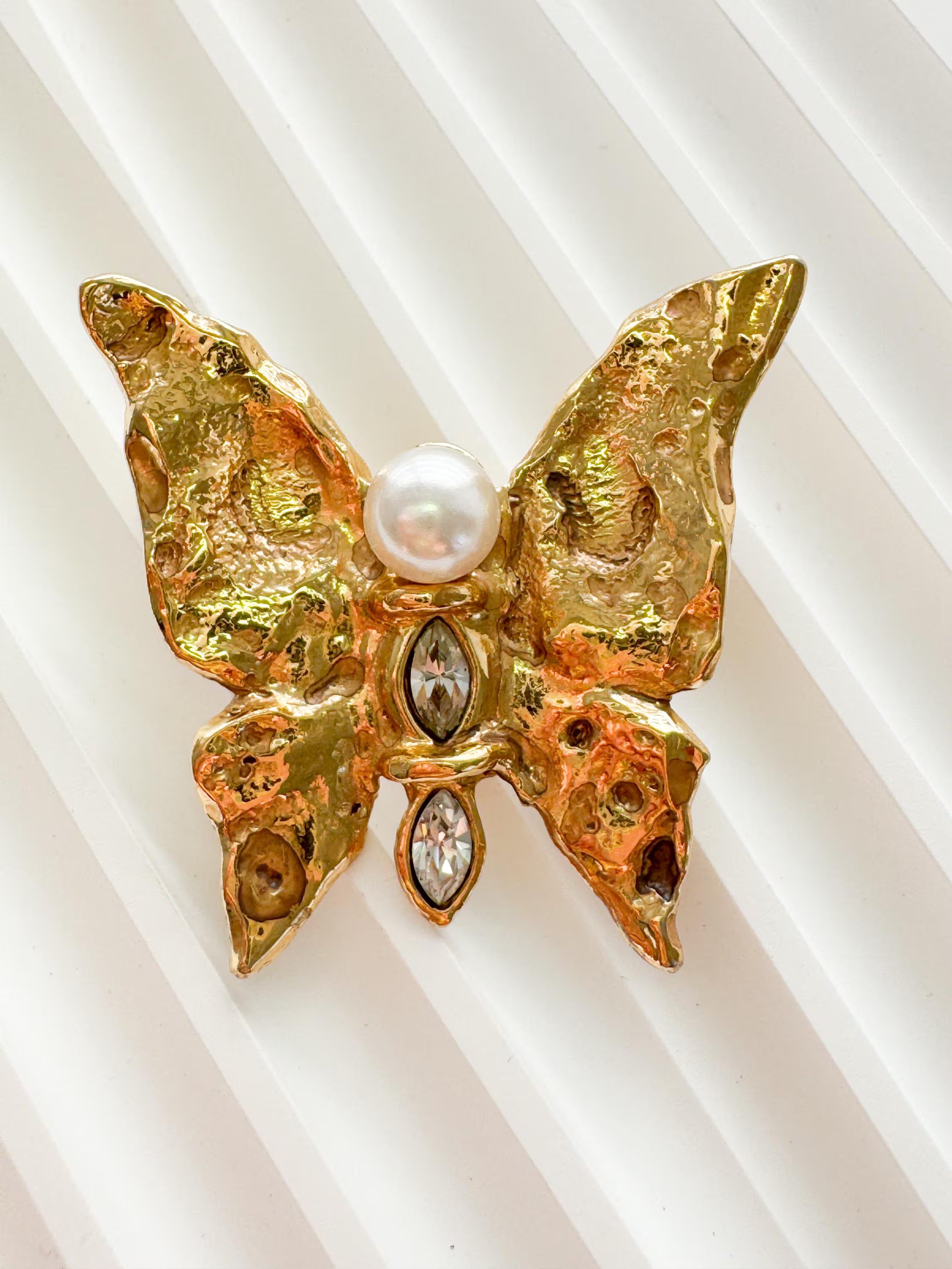 Authentic vintage YSL gold butterfly brooch, refined French designer jewelry with soft pearl detail