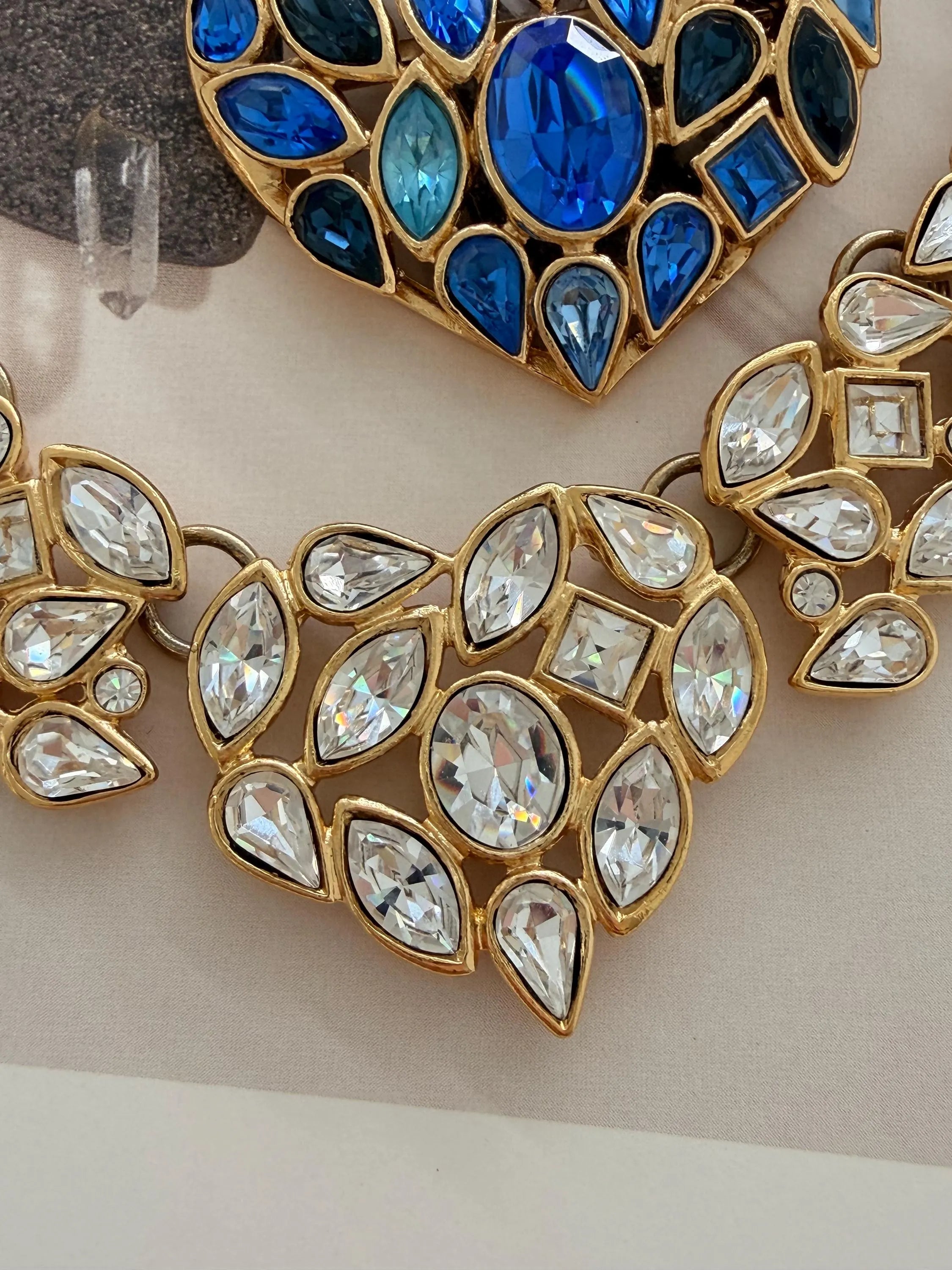 Close-up of faceted crystals on vintage YSL gold tone choker necklace