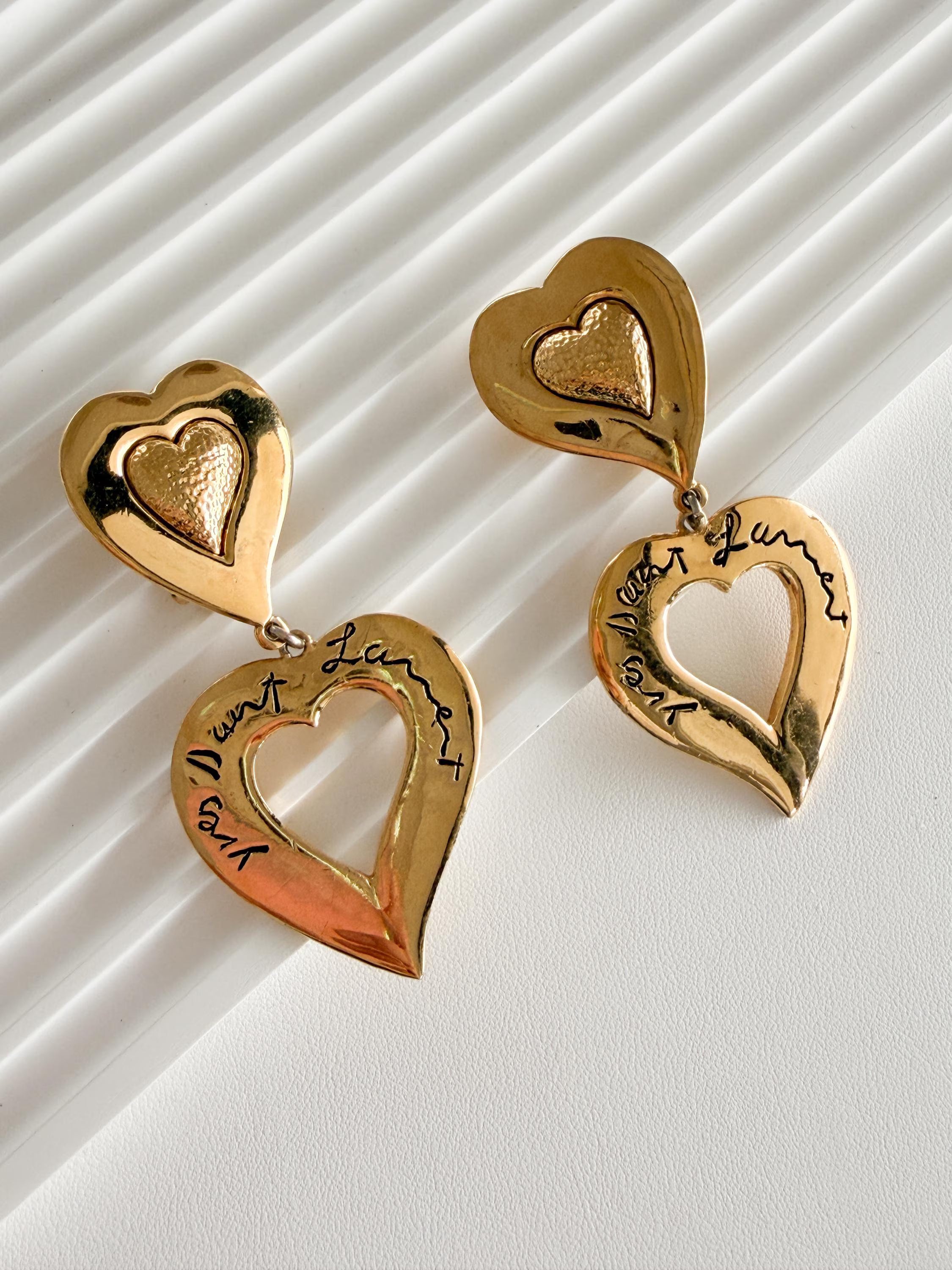 Authentic Vintage YSL Yves Saint Laurent gold double heart dangle clip-on earrings parisian statement