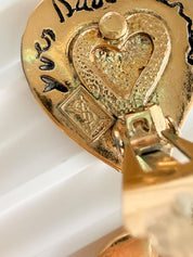 Signed YSL on authentic vintage double heart clip-on earrings