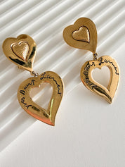 Vintage Yves Saint Laurent gold double heart dangle earrings romantic parisian style