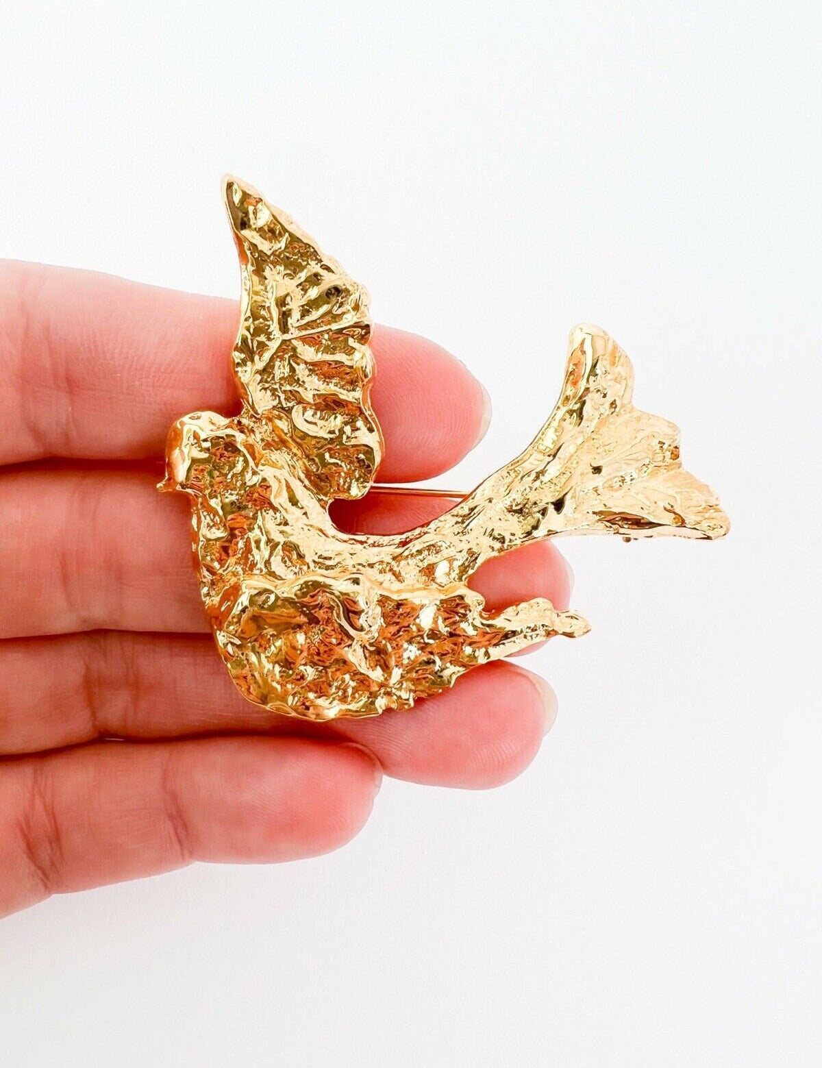 Vintage Yves Saint Laurent gold tone dove bird brooch pin elegant statement piece