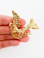 Vintage Yves Saint Laurent gold tone dove bird brooch pin elegant statement piece