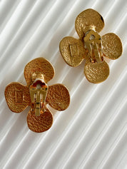 Signed YSL on authentic vintage gold flower clip-on earrings