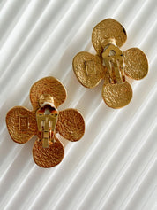 Signed YSL on authentic vintage gold flower clip-on earrings