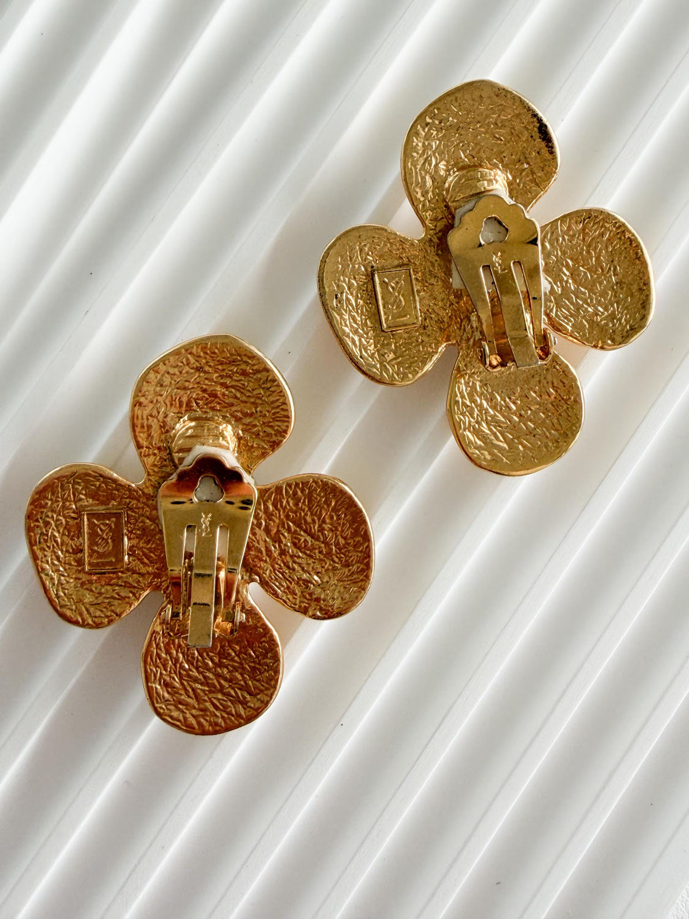 Signed YSL on authentic vintage gold flower clip-on earrings