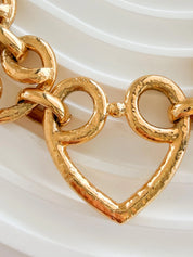 Close-up of chunky gold link chain on vintage YSL statement necklace